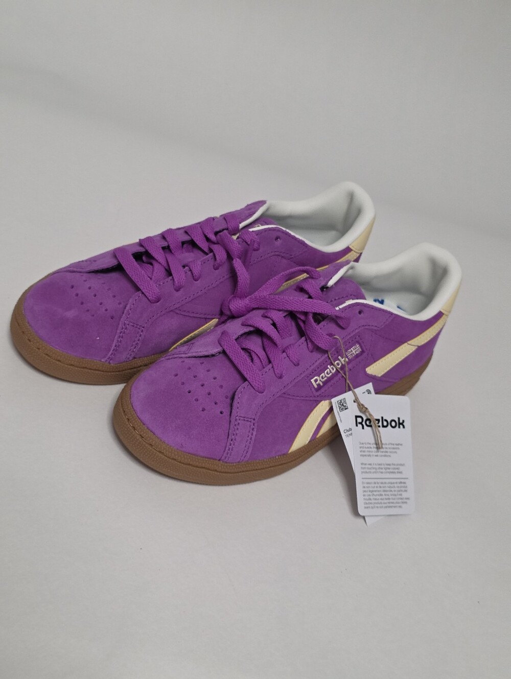 NWT Women's Reebok Club C Grounds UK in color Purple Rave/Chalk/Bleached Yellow.